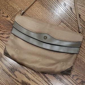 Made in the USA John Romain envelope purse.